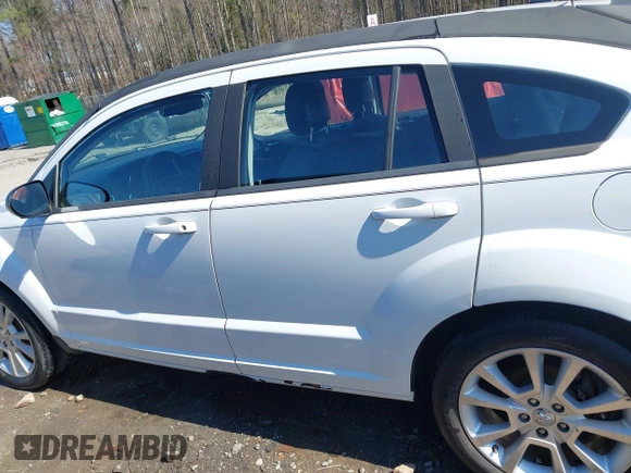 2011 Dodge Caliber Heat with VIN 1B3CB5HA6BD179014, listed as a IAAI auction lot 41704508 with 188,127 mi miles and . Bid and sale history available at DreamBid. Image 14.