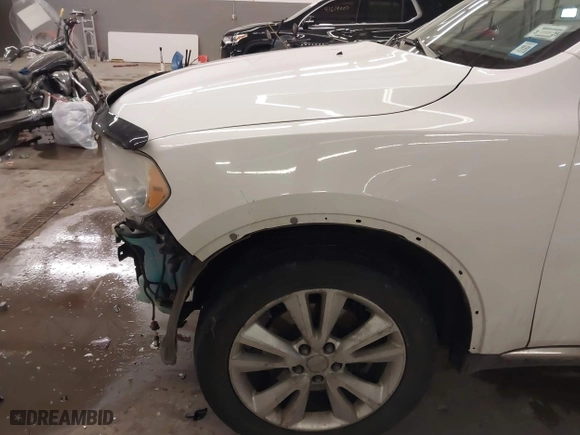2013 Dodge Durango Crew with VIN 1C4SDJDT1DC540680, listed as a IAAI auction lot 41649262 with 106,016 mi miles. Bid and sale history available at carsss.com. Image 6.