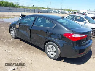 2015 Kia Forte LX with VIN KNAFK4A63F5419614, listed as a IAAI auction lot 42046799 with 117,596 mi miles. Bid and sale history available at carsss.com. Image 3.