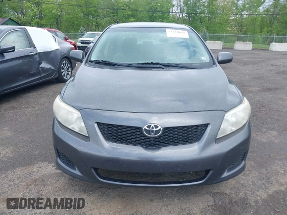 2009 Toyota Corolla with VIN JTDBL40E999048446, listed as a IAAI auction lot 42210822 with 260,005 mi miles. Bid and sale history available at carsss.com. Image 6.