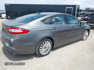 2013 Ford Fusion SE Hybrid with VIN 3FA6P0LU3DR338282, listed as a IAAI auction lot 41973498 with 187,375 mi miles. Bid and sale history available at carsss.com. Image 4.