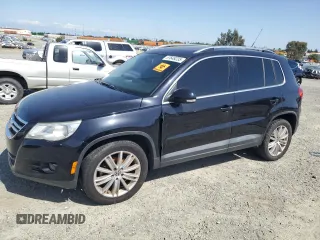 2011 Volkswagen Tiguan SEL w/Premium Navi z VIN WVGAV7AX2BW550158, wystawiony jako Copart lot #57649235 z przebiegiem 133 346 mil mil oraz Czysty tytuł • Clean title. Historia ofert i sprzedaży dostępna na DreamBid. Obrazek 1.