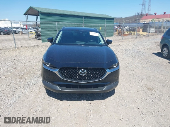 2023 Mazda CX-30 S Carbon Edition with VIN 3MVDMBCM1PM509987, listed as a IAAI auction lot 42060833 with 14,140 mi miles and . Bid and sale history available at DreamBid. Image 12.