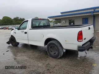 2002 Ford F-150 XL with VIN 1FTRF17W32NB86385, listed as a Copart auction lot 73276754 with 100,817 mi miles and Salvage Title. Bid and sale history available at carsss.com. Image 2.