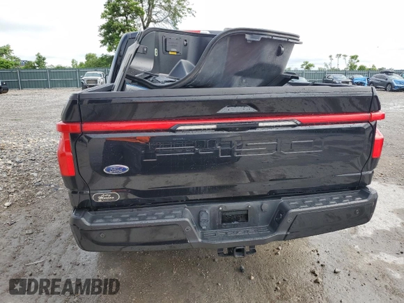 2022 Ford F-150 Lightning Pro with VIN 1FTVW1EL7NWG00726, listed as a Copart auction lot 57283755 with 55,672 mi miles and Salvage title. Bid and sale history available at DreamBid. Image 6.
