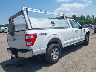2021 Ford F-150 XL with VIN 1FTMF1E5XMKE21132, listed as a IAAI auction lot 42445898 with 114,014 mi miles and . Bid and sale history available at DreamBid. Image 4.
