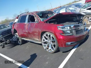 2016 Chevrolet Tahoe LTZ with VIN 1GNSCCKC3GR206418, listed as a IAAI auction lot 41876563 with Not provided miles and . Bid and sale history available at DreamBid. Image 1.