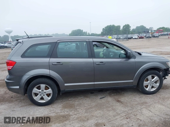 2013 Dodge Journey American Value with VIN 3C4PDCAB2DT645973, listed as a IAAI auction lot 42449402 with 133,000 mi miles and . Bid and sale history available at DreamBid. Image 14.