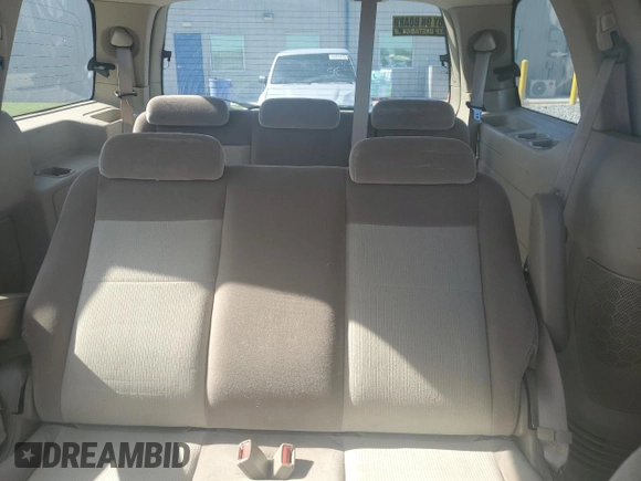 2006 Ford Freestar SE z VIN 2FMZA51636BA02932, wystawiony jako Copart lot #52506005 z przebiegiem 74 512 mil mil oraz Szkody całkowita. Historia ofert i sprzedaży dostępna na DreamBid. Obrazek 10.