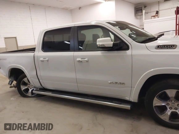 2021 Ram 1500 Laramie with VIN 1C6SRFJT6MN671456, listed as a IAAI auction lot 41087757 with 40,593 mi miles and . Bid and sale history available at DreamBid. Image 13.
