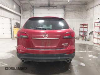 2015 Mazda CX-9 Grand Touring z VIN JM3TB3DAXF0464215, wystawiony jako IAAI lot #42043092 z przebiegiem 119 269 mil mil oraz . Historia ofert i sprzedaży dostępna na DreamBid. Obrazek 16.