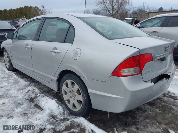 2011 Honda Civic Sdn LX with VIN 2HGFA1F54BH520203, listed as a IAAI auction lot 41708981 with 176,451 mi miles. Bid and sale history available at carsss.com. Image 3.