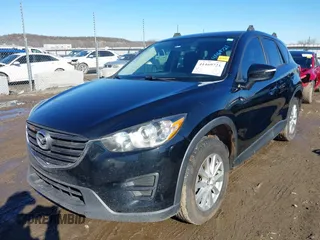 2016 Mazda CX-5 Sport with VIN JM3KE4BY0G0662294, listed as a IAAI auction lot 41469721 with 127,116 mi miles and . Bid and sale history available at carsss.com. Image 18.