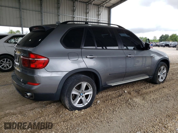 2012 BMW X5 35d with VIN 5UXZW0C53CL671564, listed as a Copart auction lot 60880715 with 154,401 mi miles and Clean title. Bid and sale history available at DreamBid. Image 3.