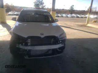2017 BMW X1 sDrive28i with VIN WBXHU7C31H5H37217, listed as a Copart auction lot 70114342 with 73,683 mi miles. Bid and sale history available at carsss.com. Image 5.