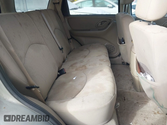 2006 Mazda Tribute LX with VIN 4F2YZ94126KM09467, listed as a IAAI auction lot 41324941 with 116,519 mi miles and . Bid and sale history available at DreamBid. Image 8.