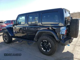 2024 Jeep Wrangler Rubicon with VIN 1C4RJXR69RW132849, listed as a Copart auction lot 48237325 with 18,725 mi miles and Salvage Title. Bid and sale history available at DreamBid. Image 2.