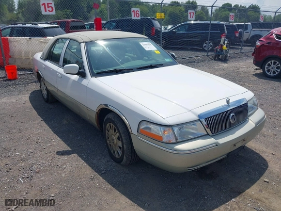 2004 Mercury Grand Marquis GS with VIN 2MEFM74W44X673224, listed as a IAAI auction lot 40670734 with 83,219 mi miles. Bid and sale history available at carsss.com. Image 1.
