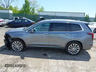 2022 Cadillac XT6 Premium Luxury z VIN 1GYKPDRS4NZ146284, wystawiony jako IAAI lot #42150678 z przebiegiem 28 890 mil mil oraz . Historia ofert i sprzedaży dostępna na DreamBid. Obrazek 15.