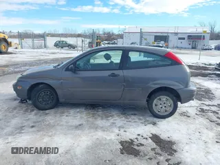 2007 Ford Focus S z VIN 1FAHP31N87W243692, wystawiony jako IAAI lot #41312958 z przebiegiem 184 717 mil mil oraz . Historia ofert i sprzedaży dostępna na DreamBid. Obrazek 14.