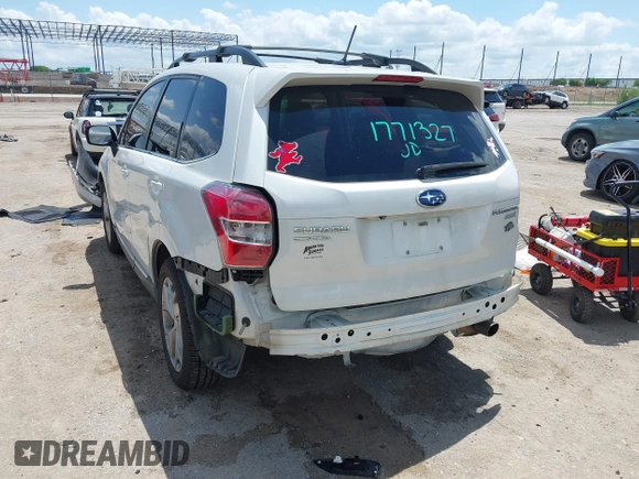 2015 Subaru Forester Touring with VIN JF2SJAWC0FH806493, listed as a IAAI auction lot 42355867 with 128,937 mi miles and . Bid and sale history available at DreamBid. Image 3.