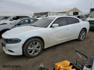 2022 Dodge Charger SXT with VIN 2C3CDXJG2NH221659, listed as a Copart auction lot 83803154 with 53,279 mi miles and Salvage Title. Bid and sale history available at carsss.com. Image 1.