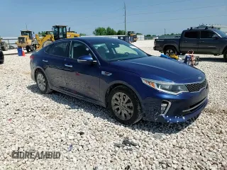 2018 Kia Optima LX z VIN 5XXGT4L35JG191868, wystawiony jako Copart lot #56230865 z przebiegiem 128 208 mil mil oraz Czysty tytuł • Clean title. Historia ofert i sprzedaży dostępna na DreamBid. Obrazek 13.