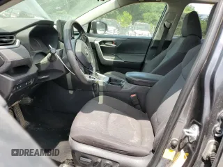 2019 Toyota RAV4 XLE with VIN JTMP1RFV8KD013125, listed as a Copart auction lot 59328465 with 106,947 mi miles and Salvage title. Bid and sale history available at DreamBid. Image 7.