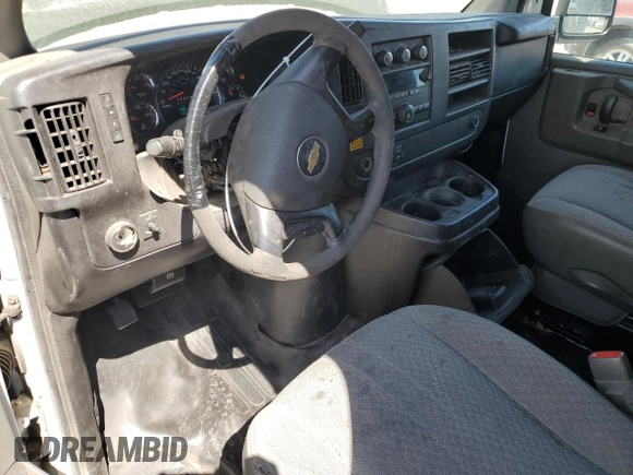 2013 Chevrolet Express Cargo z VIN 1GCZGTCA9D1165263, wystawiony jako Copart lot #51661055 z przebiegiem 172 369 mil mil oraz Szkoda całkowita • Salvage title. Historia ofert i sprzedaży dostępna na DreamBid. Obrazek 8.