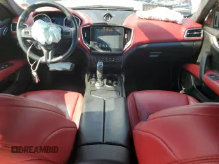 2019 Maserati Ghibli S Q4 z VIN ZAM57YTA8K1328392, wystawiony jako Copart lot #50711685 z przebiegiem 56 609 mil mil oraz Szkoda całkowita • Salvage title. Historia ofert i sprzedaży dostępna na DreamBid. Obrazek 8.