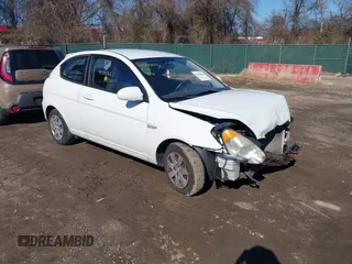 2008 Hyundai Accent GS with VIN KMHCM36C68U055850, listed as a IAAI auction lot 41590651 with 198,827 mi miles. Bid and sale history available at carsss.com. Image 1.