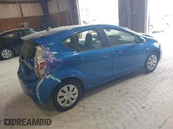 2012 Toyota Prius One with VIN JTDKDTB32C1023106, listed as a IAAI auction lot 42185223 with 210,691 mi miles. Bid and sale history available at carsss.com. Image 4.