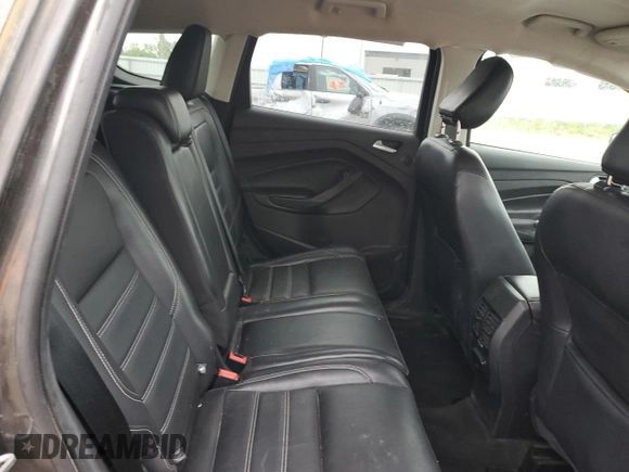 2019 Ford Escape Titanium z VIN 1FMCU9J99KUC31182, wystawiony jako Copart lot #60972815 z przebiegiem 94 464 mil mil oraz Szkoda całkowita • Salvage title. Historia ofert i sprzedaży dostępna na DreamBid. Obrazek 11.