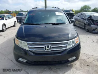 2013 Honda Odyssey Touring with VIN 5FNRL5H92DB003200, listed as a IAAI auction lot 41920237 with 167,483 mi miles. Bid and sale history available at carsss.com. Image 12.