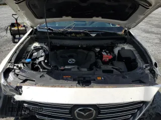 2019 Mazda CX-9 Touring z VIN JM3TCBCY9K0305038, wystawiony jako Copart lot #56707735 z przebiegiem 76 546 mil mil oraz Szkoda całkowita • Salvage title. Historia ofert i sprzedaży dostępna na DreamBid. Obrazek 12.