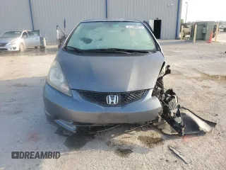 2013 Honda Fit с VIN JHMGE8H33DC067627, выставлен на аукционе Copart как лот 51168015 с пробегом 170 522 миль миль и Списание • Salvage title. История ставок и продаж доступна на DreamBid. Изображение 5.