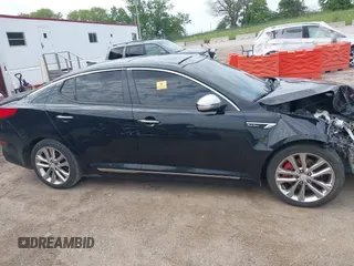 2014 Kia Optima SX Turbo with VIN 5XXGR4A65EG276131, listed as a IAAI auction lot 42429004 with 136,766 mi miles and . Bid and sale history available at DreamBid. Image 13.