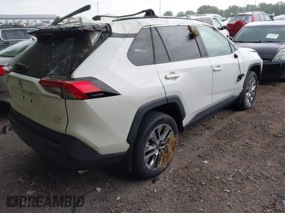 2022 Toyota RAV4 XLE Premium z VIN 2T3A1RFV1NW312419, wystawiony jako IAAI lot #42361686 z przebiegiem 14 291 mil mil oraz . Historia ofert i sprzedaży dostępna na DreamBid. Obrazek 4.