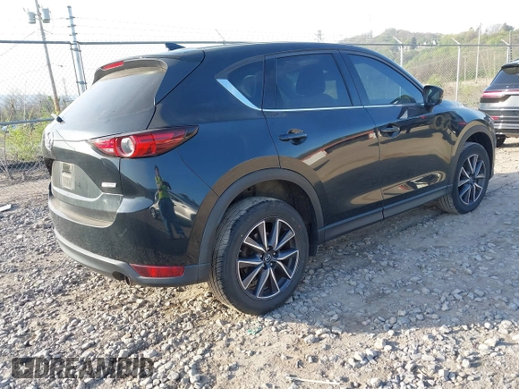 2018 Mazda CX-5 Grand Touring with VIN JM3KFBDM2J0463279, listed as a IAAI auction lot 42115309 with 68,851 mi miles. Bid and sale history available at carsss.com. Image 4.