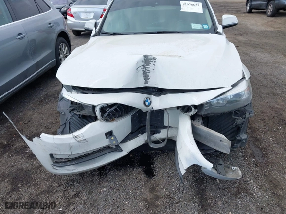 2014 BMW 3 Series Gran Turismo 328i xDrive with VIN WBA3X5C5XED559713, listed as a IAAI auction lot 42078622 with 68,233 mi miles. Bid and sale history available at carsss.com. Image 6.