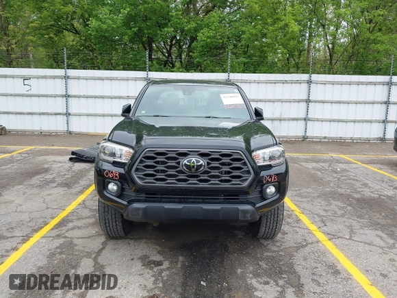 2021 Toyota Tacoma SR with VIN 3TMCZ5AN0MM417261, listed as a IAAI auction lot 42240693 with 38,625 mi miles and . Bid and sale history available at DreamBid. Image 13.