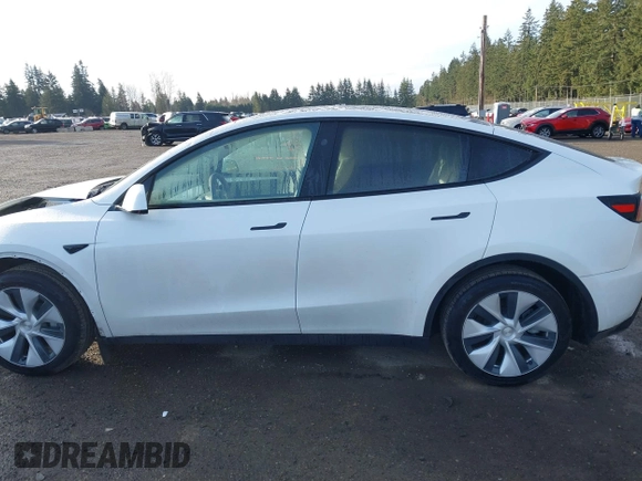 2024 Tesla Model Y Long Range with VIN 7SAYGDEE1RF056816, listed as a IAAI auction lot 41809125 with 6,434 mi miles and . Bid and sale history available at DreamBid. Image 15.