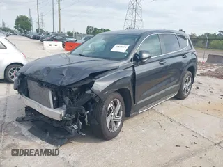 2021 Hyundai Santa Fe SE with VIN 5NMS14AJ7MH355662, listed as a IAAI auction lot 41848014 with 49,570 mi miles. Bid and sale history available at carsss.com. Image 2.