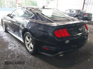 2021 Ford Mustang EcoBoost z VIN 1FA6P8TH4M5126706, wystawiony jako IAAI lot #42465164 z przebiegiem 49 795 mil mil oraz . Historia ofert i sprzedaży dostępna na DreamBid. Obrazek 3.