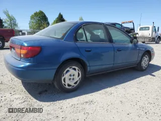 2001 Saturn SL z VIN 1G8ZK547X1Z294553, wystawiony jako Copart lot #53786805 z przebiegiem 288 011 mil mil oraz Szkody całkowita. Historia ofert i sprzedaży dostępna na DreamBid. Obrazek 3.