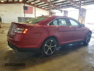 2015 Ford Taurus SEL with VIN 1FAHP2E83FG143653, listed as a Copart auction lot 59280645 with 77,048 mi miles and Salvage title. Bid and sale history available at DreamBid. Image 3.
