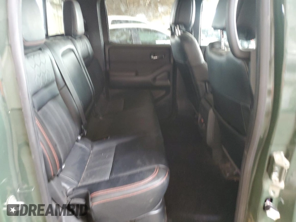 2023 Nissan Frontier Pro-4X z VIN 1N6ED1EK4PN671708, wystawiony jako Copart lot #58271305 z przebiegiem 22 906 mil mil oraz Szkoda całkowita • Salvage title. Historia ofert i sprzedaży dostępna na DreamBid. Obrazek 10.