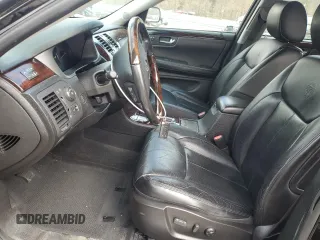 2008 Cadillac DTS 1SD z VIN 1G6KD57Y68U203116, wystawiony jako Copart lot #50050045 z przebiegiem 81 777 mil mil oraz Szkoda całkowita • Salvage title. Historia ofert i sprzedaży dostępna na DreamBid. Obrazek 7.