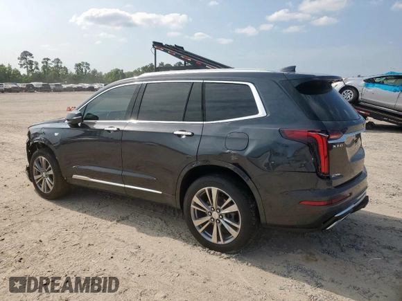 2022 Cadillac XT6 Premium Luxury z VIN 1GYKPCRS1NZ104567, wystawiony jako Copart lot #58211505 z przebiegiem 54 541 mil mil oraz Tytuł czysty. Historia ofert i sprzedaży dostępna na DreamBid. Obrazek 2.
