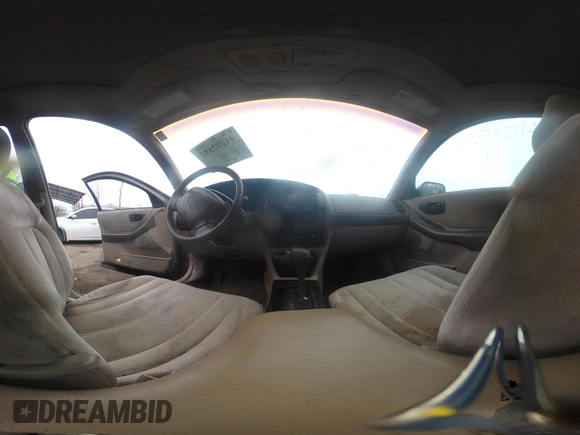 1998 Toyota Avalon XL with VIN 4T1BF18B7WU256930, listed as a IAAI auction lot 41297552 with 210,745 mi miles and . Bid and sale history available at DreamBid. Image 19.